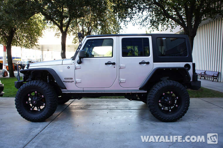 Silver jeep wrangler with black rims #5